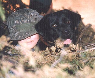 Checkers and Ethan in the duck blind
